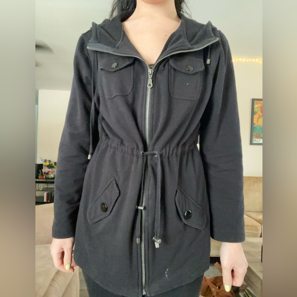 Black size medium jacket fits like a small